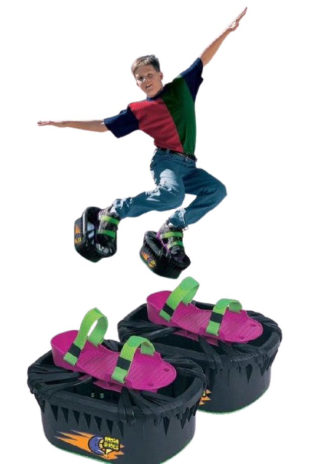 A studio composite photo displaying a pair of black-and-pink plastic Moon Shoes with neon green straps, alongside a kid leaping high into the air on a black background.