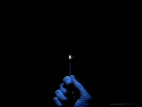 Animated GIF showing a hand striking a match in the dark, revealing the red title text for the 1990s Nickelodeon horror anthology series "Are You Afraid of the Dark?"