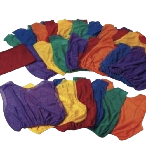 anned-out piles of breathable mesh gym class scrimmage pinnies in neon red, yellow, green, purple, and blue used to split up dodgeball teams.