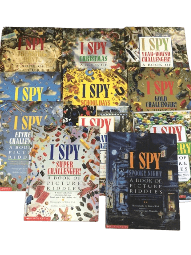 A grid layout of Walter Wick and Jean Marzollo's I Spy hardcover books, including 'Spooky Night', 'Super Challenger!', and 'Christmas', filled with intricate visual scavenger hunts.