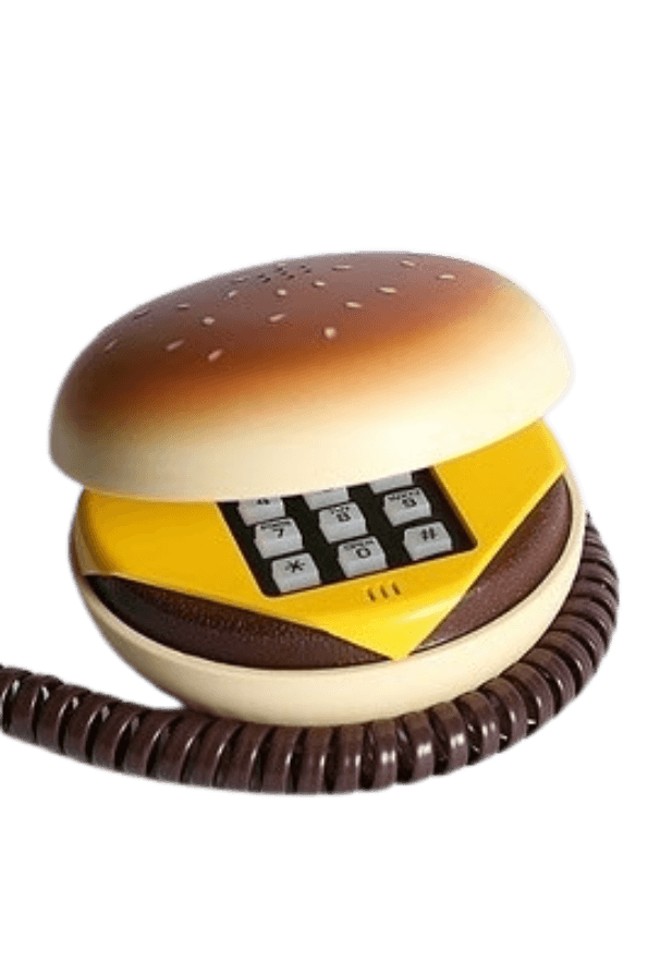 A novelty 1990s landline telephone shaped like a cheeseburger, with the numeric keypad hidden inside the top bun.