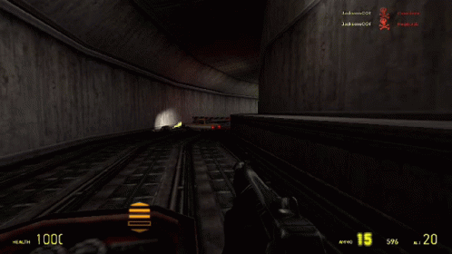 An animated GIF from Half-Life showing Gordon Freeman steering a motorized rail cart down dark, concrete underground transit tunnels at the Black Mesa Research Facility while wielding a shotgun.