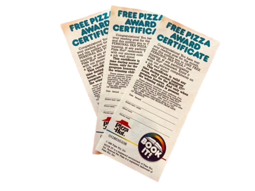 A stack of three official paper Pizza Hut BOOK IT! Free Pizza Award Certificates earned by elementary school kids for hitting their monthly reading goals.
