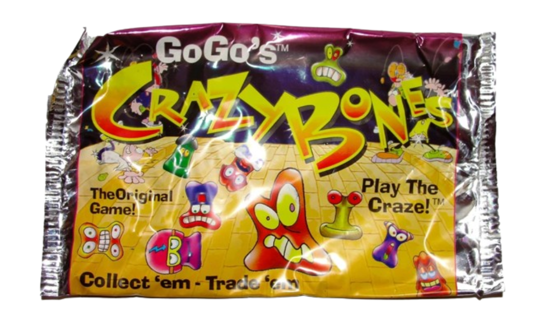 A static photo of a metallic silver foil blind bag for GoGo's Crazy Bones, displaying cartoon game characters under the tagline "Collect 'em - Trade 'em."
