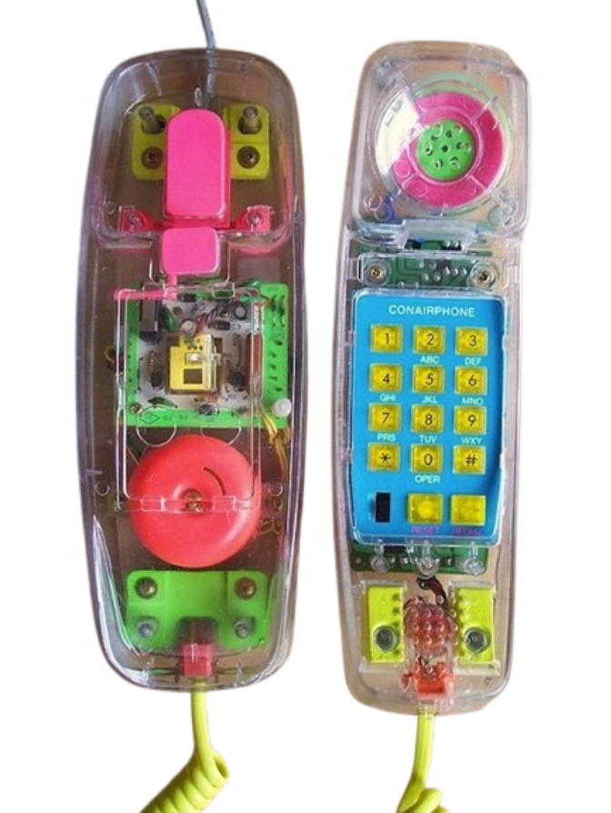 vintage 1990s clear transparent Conair landline telephone showing its colorful internal wiring, circuit board, bell ringer, and neon-colored keypad buttons.
