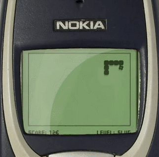 gameplay of the addictive 8-bit Snake II game crawling across the monochrome green LCD screen of an original Nokia 3310 brick phone.
