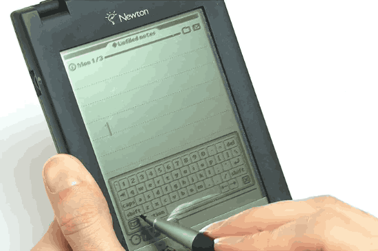 stylus tapping out text on the pop-up virtual QWERTY keyboard of an Apple Newton MessagePad PDA