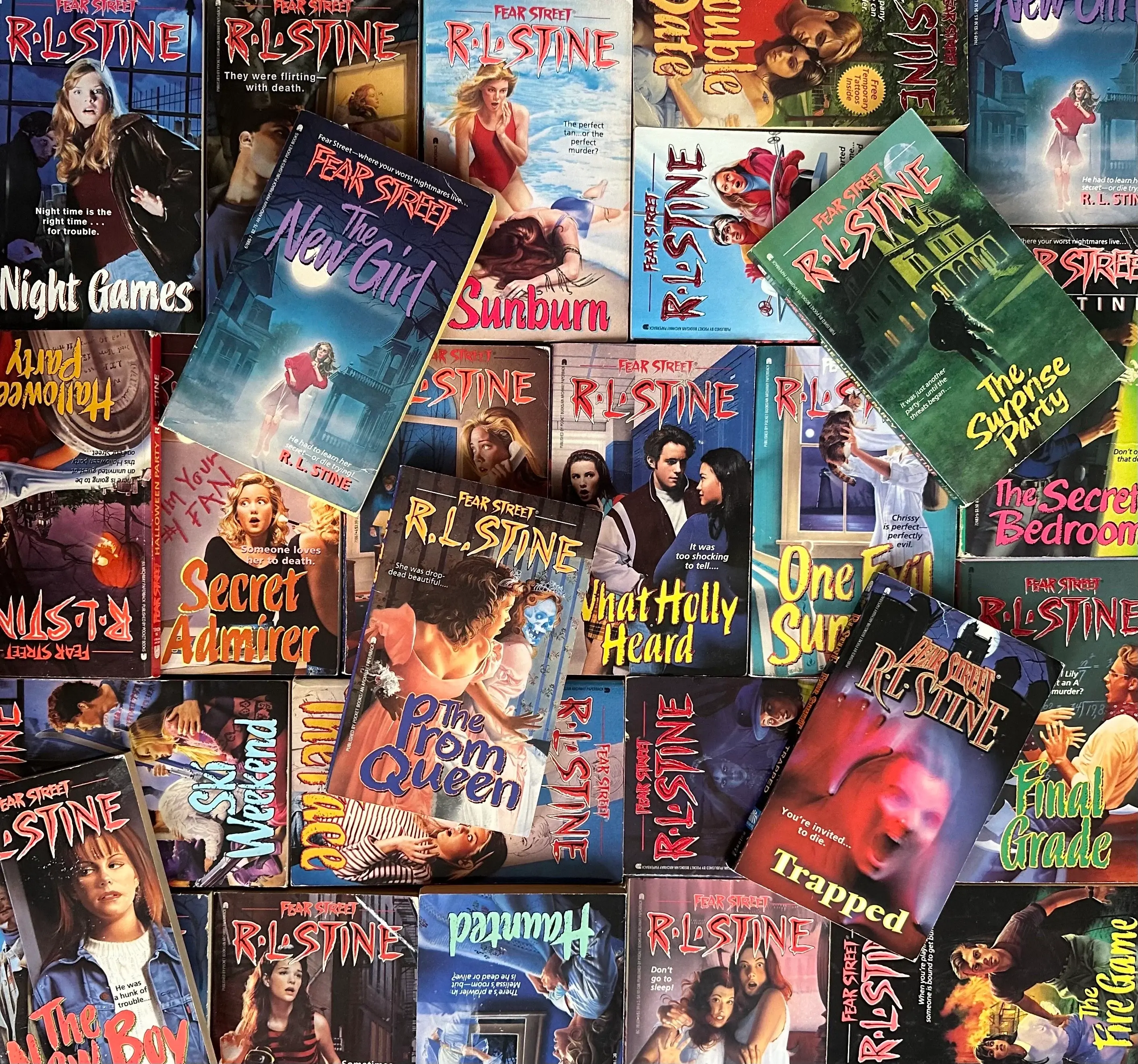 A sprawling collage of retro R.L. Stine Fear Street paperback novels, including classic teen horror titles like The Prom Queen, The New Girl, Trapped, and Secret Admirer—the ultimate pre-Goosebumps gateway drug for 90s thriller junkies.