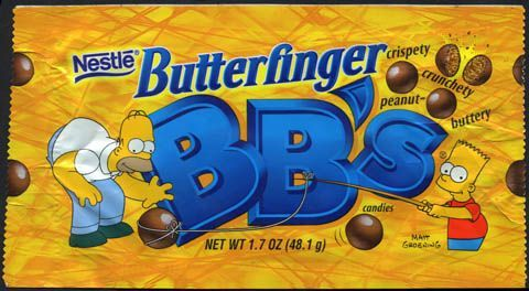 Nestlé Butterfinger BB's Candy Wrapper Bright yellow 1990s Nestlé Butterfinger BB's candy pouch featuring Homer and Bart Simpson wrangling crunchy chocolate-coated peanut butter balls.