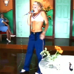 No doubt music video - Gwen singing in white top and blue pants
