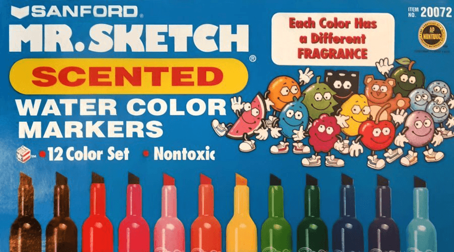 The front box art for a 12-pack of Mr. Sketch Scented Water Color Markers, featuring cartoon fruit mascots wearing sneakers—the primary source of 90s elementary school marker-sniffing addiction.