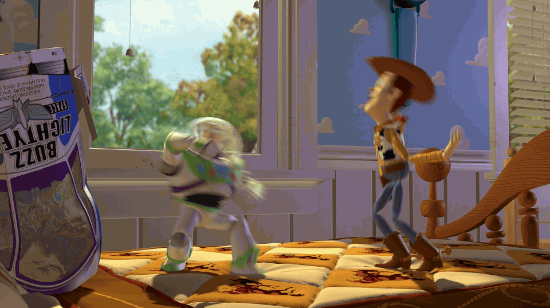 An animated GIF from Toy Story showing Buzz Lightyear bouncing off a bed to 'fly' across the room while Woody watches in complete disbelief.
