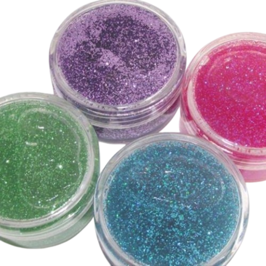 Four open tubs of thick 90s cosmetic body glitter gel in sparkling emerald green, deep amethyst purple, electric hot pink, and icy aqua blue.