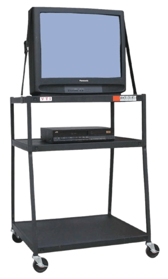 A rolling black metal AV cart loaded with a heavy Panasonic CRT television and a VCR, signaling to the entire classroom that the teacher was giving up and playing a movie on a rainy afternoon.