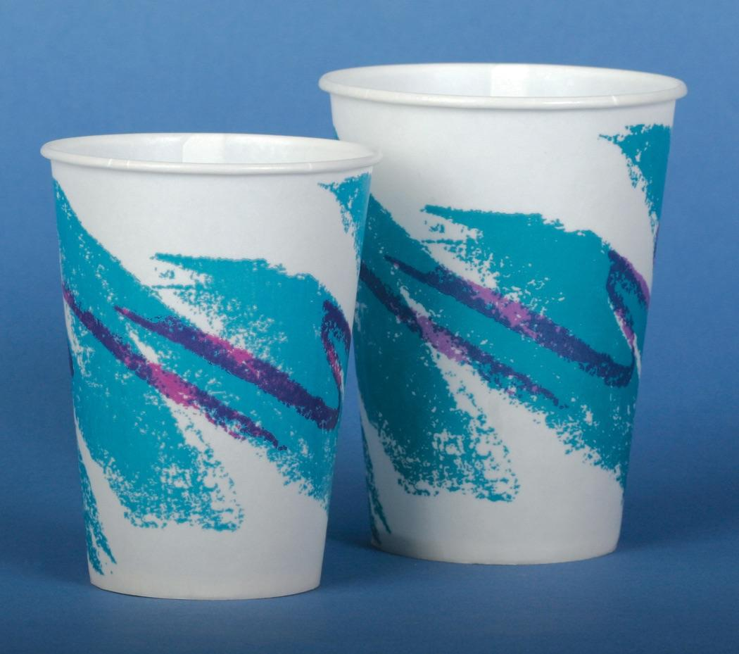 A pair of paper drinking cups featuring the iconic 1992 'Jazz' teal and purple zigzag splash pattern alongside a classic red plastic Solo cup.