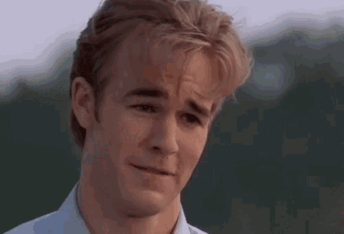 Animated GIF of Dawson Leery screwing up his face in an ugly cry reaction meme from the Dawson's Creek Season 3 finale.